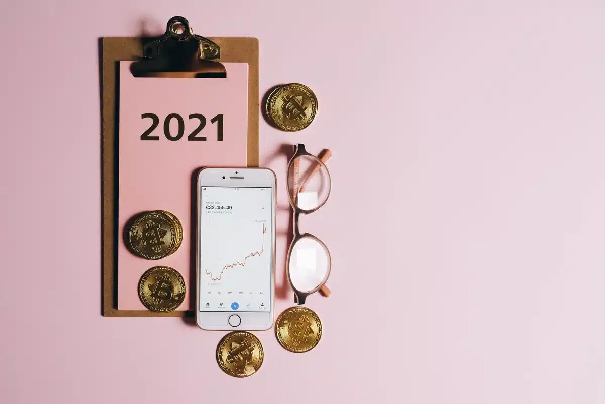 A sleek smartphone displayed on a minimalist stand under soft spotlight, with a price tag visible in the background, embodying premium positioning and cost consciousness
