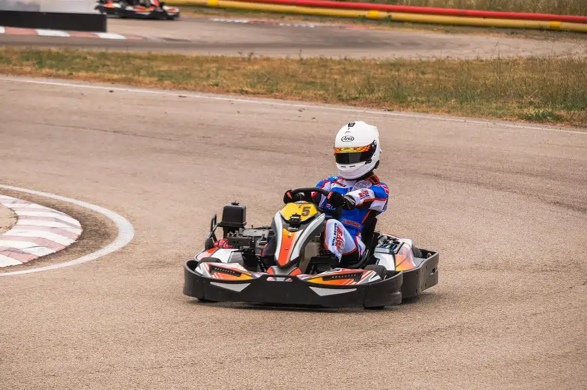 A sleek modern racing car on a technical circuit corner, tire smoke trailing behind, precision and control evident in the dynamic moment