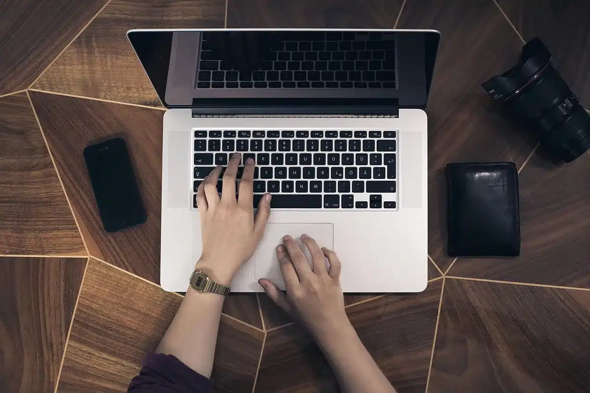 A split-screen composition showing an iPhone on one side and a Huawei Watch on the other, with a subtle visual barrier between them, suggesting connectivity challenges.