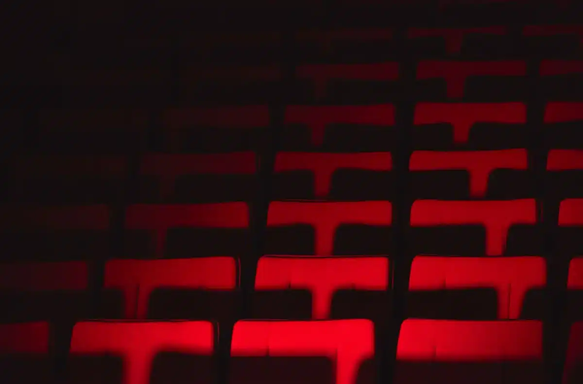 empty stage with single microphone under spotlight