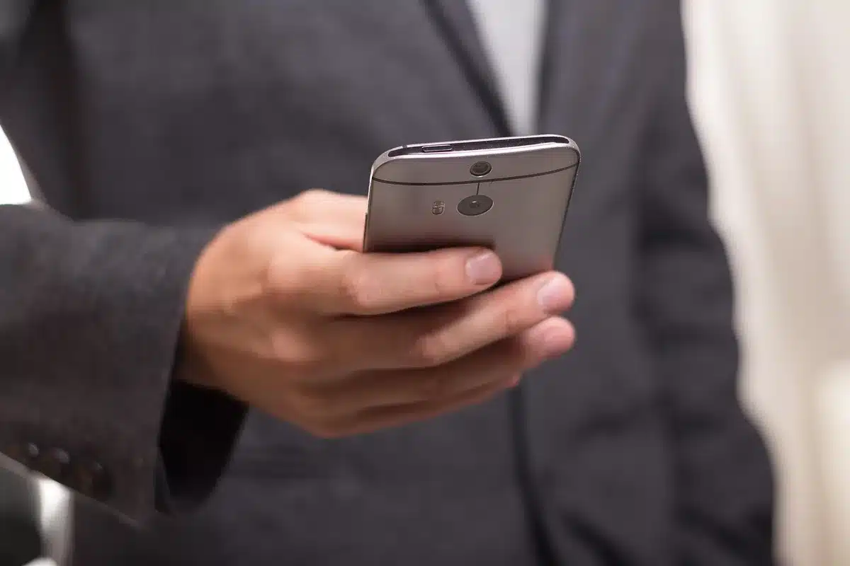Close-up of an unbranded smartphone screen showing a messages list with a separate "Unknown" folder visible, no logos or identifiable UI elements