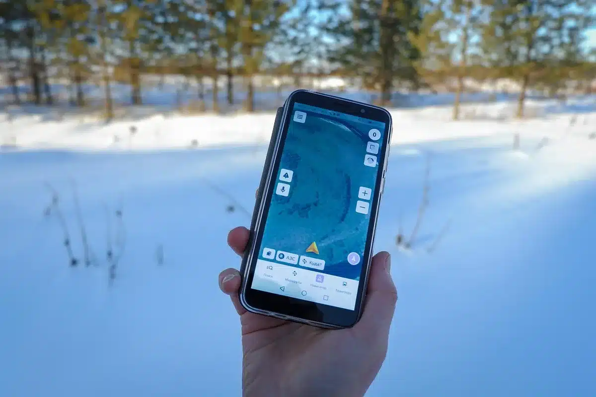 close-up of anonymous smartphone screen showing a generic map pin and walking route, hands out-of-focus