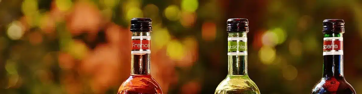 close-up of a generic unbranded cylindrical bottle being printed by a robotic arm, no logos, industrial environment