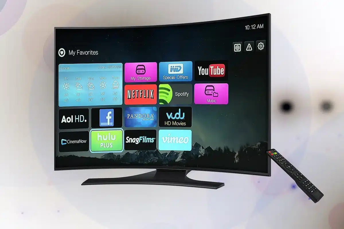 tabletop smart display showing anonymous app icons and playback controls