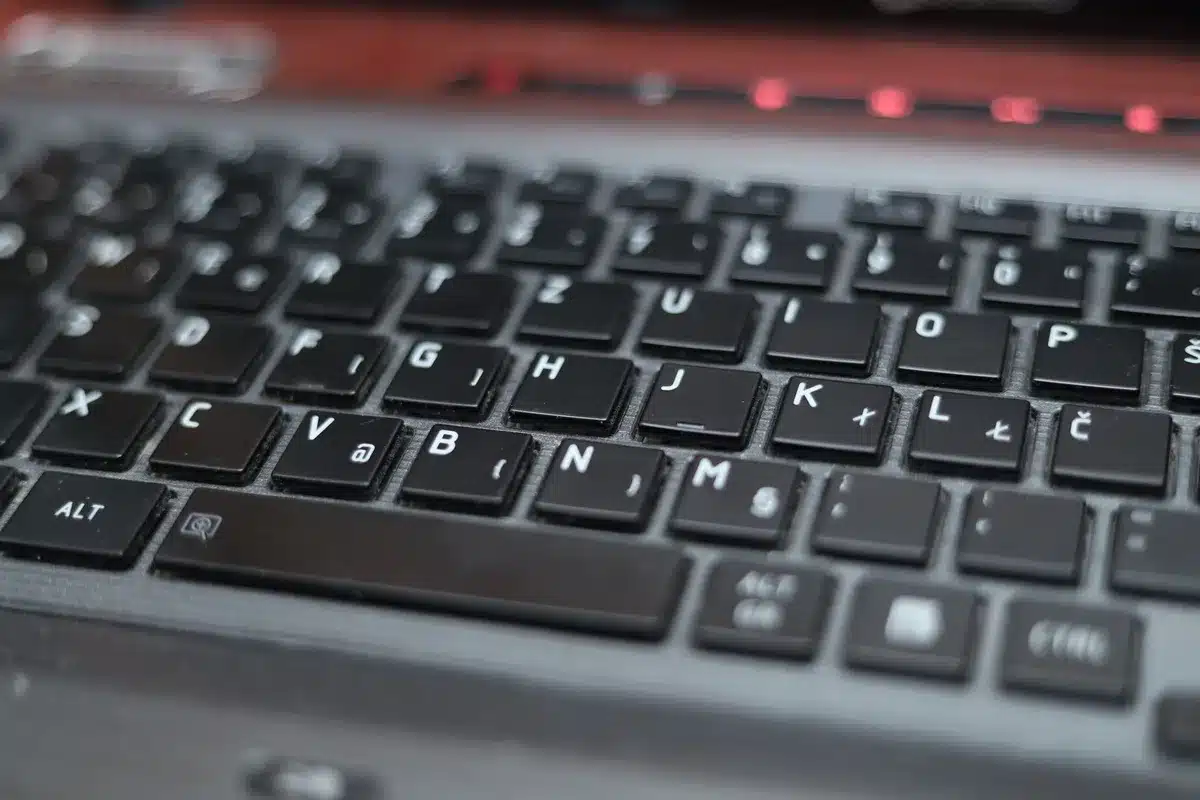 close-up of a generic laptop keyboard and trackpad, anonymous, no brand