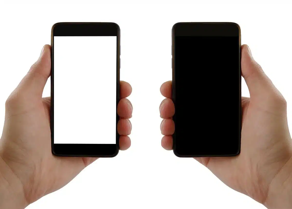 empty retail shelf with anonymous smartphones on display, price tags blurred